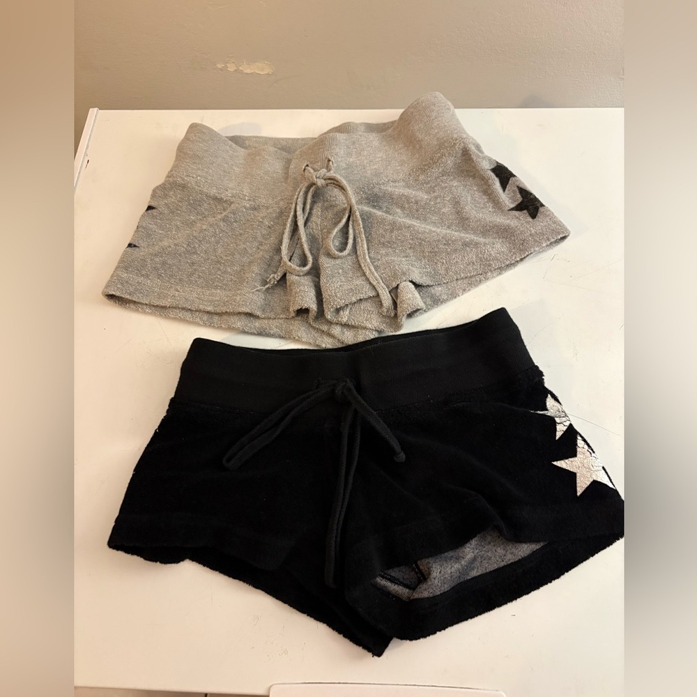Pair of Hard Tail Shorts size medium black and gray with stars